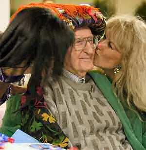 Mr. Ernest Pusey with Belly Dancers