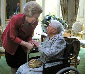 Mrs. Hendrikje Van
Andel with Queen Beatrix  of Holland