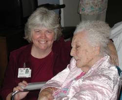 Mrs. Madge Russell with
Administrator